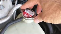 How to open a dodge caliber radiator cap