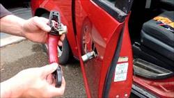 How to remove Dodge Caravan door handle